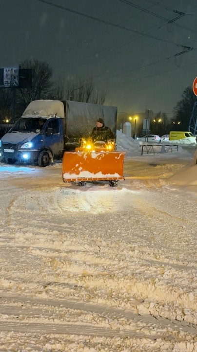 Трактор Kubota для уборки снега