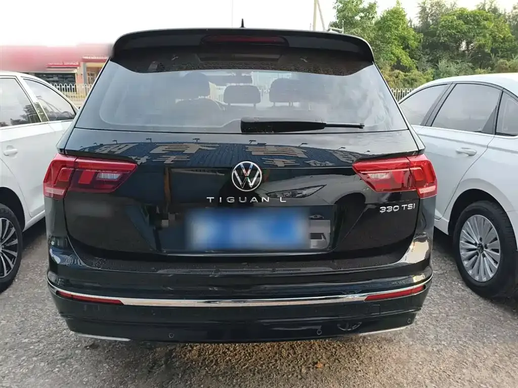 Volkswagen Tiguan L — фото 6