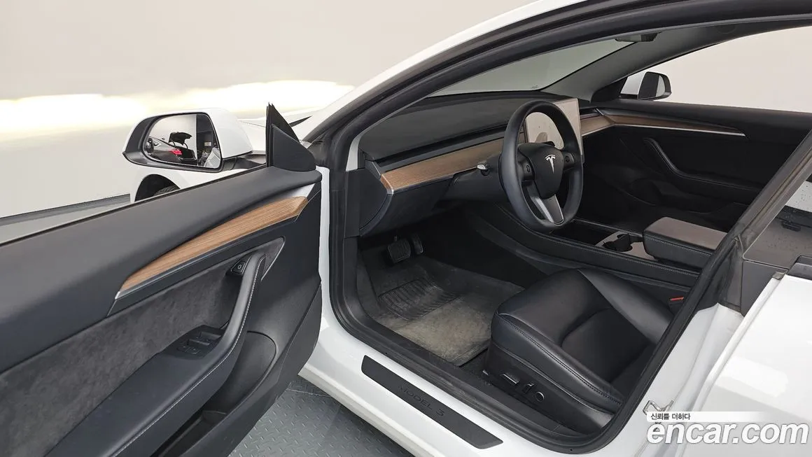 Tesla Model 3 — фото 10