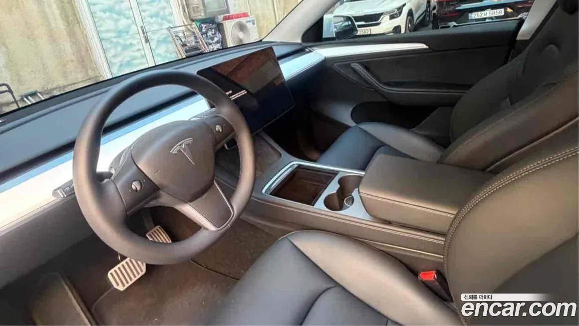 Tesla Model Y — фото 6