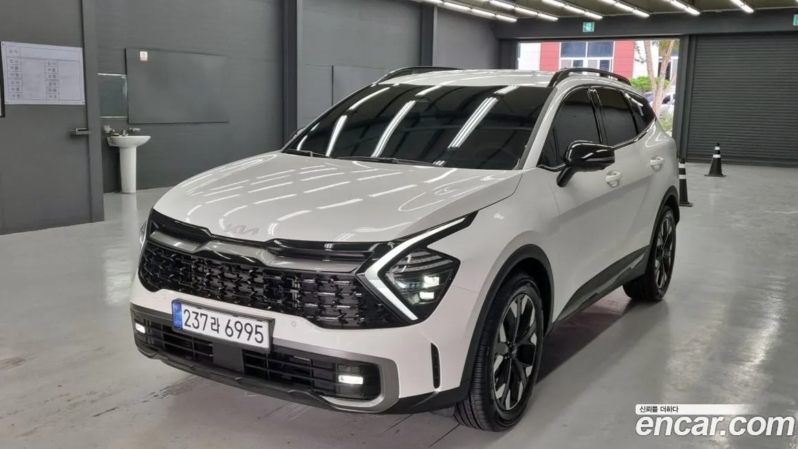 Kia Sportage — фото 1