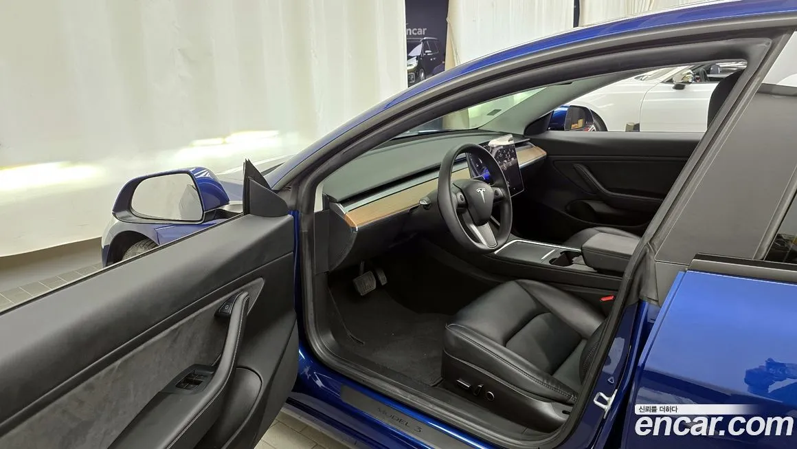 Tesla Model 3 — фото 10