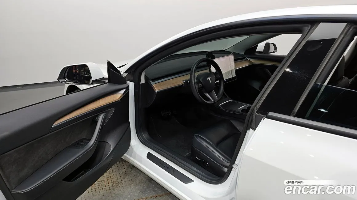 Tesla Model 3 — фото 10