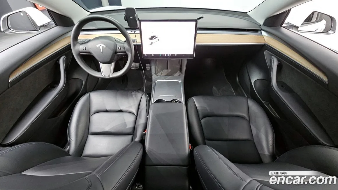 Tesla Model 3 — фото 7