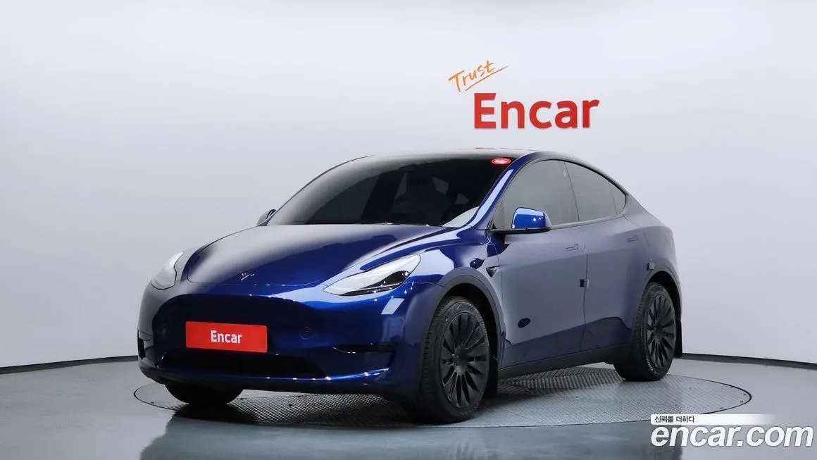 Tesla Model Y — фото 1