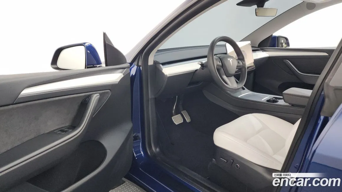 Tesla Model Y — фото 10