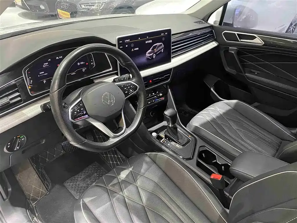Volkswagen Tiguan L — фото 7