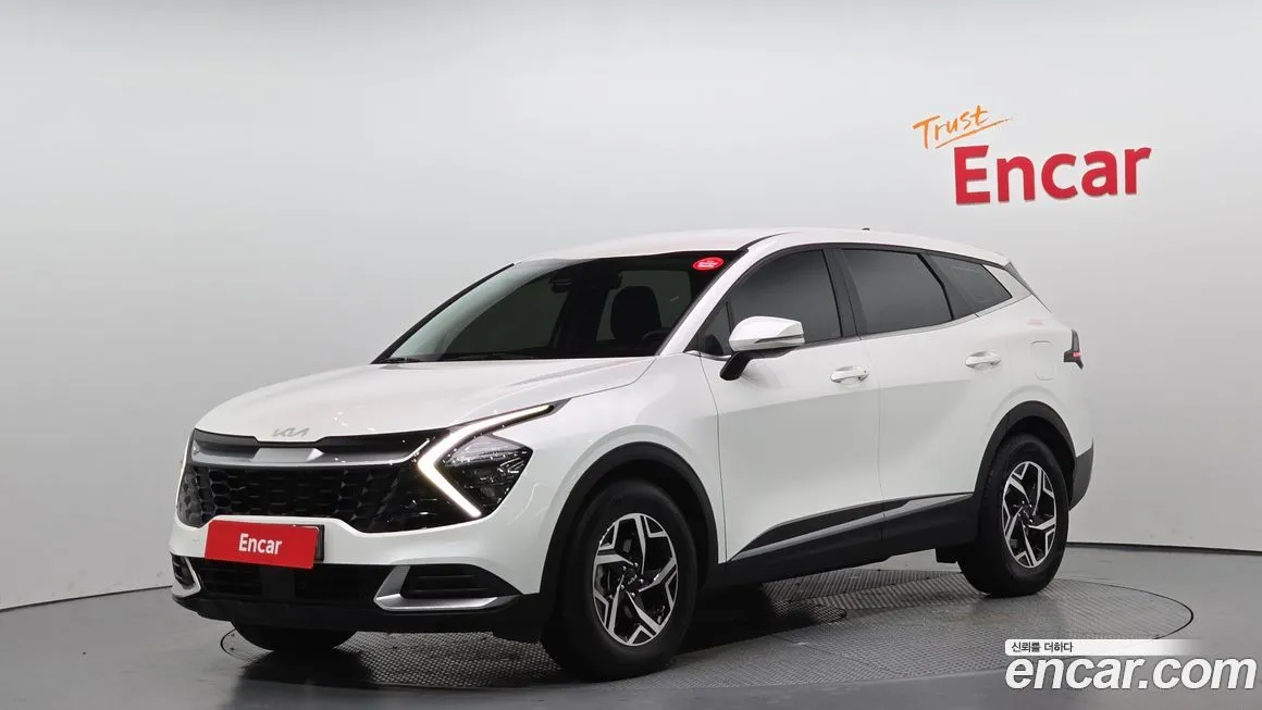 Kia Sportage — фото 1