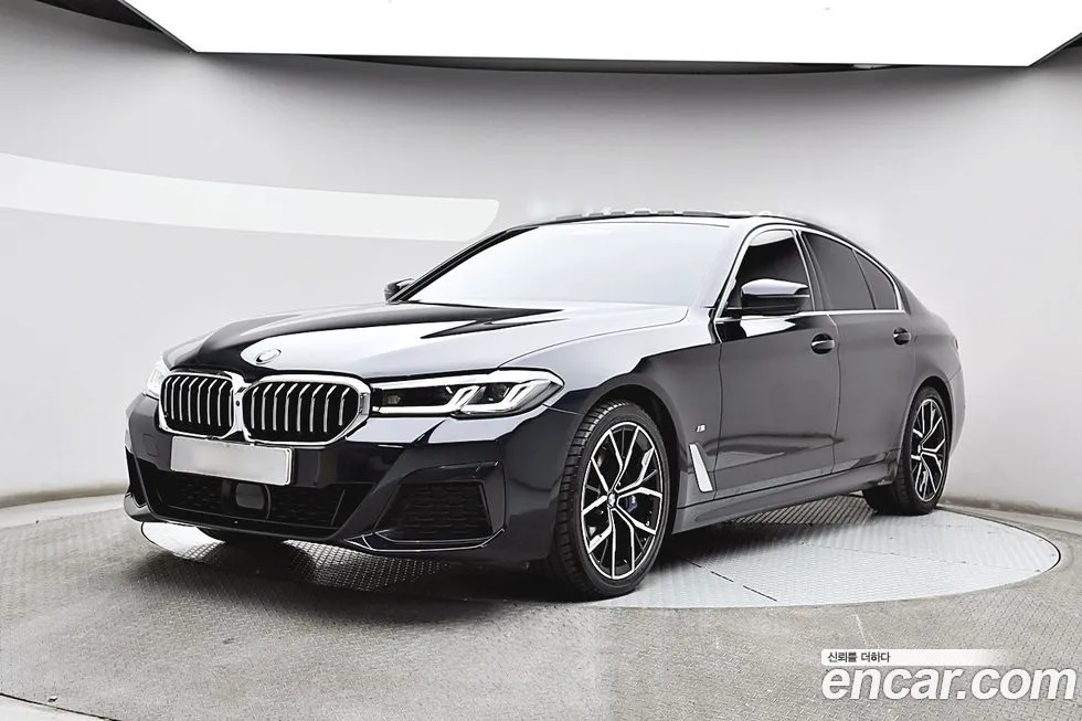 BMW 5-Series — фото 1
