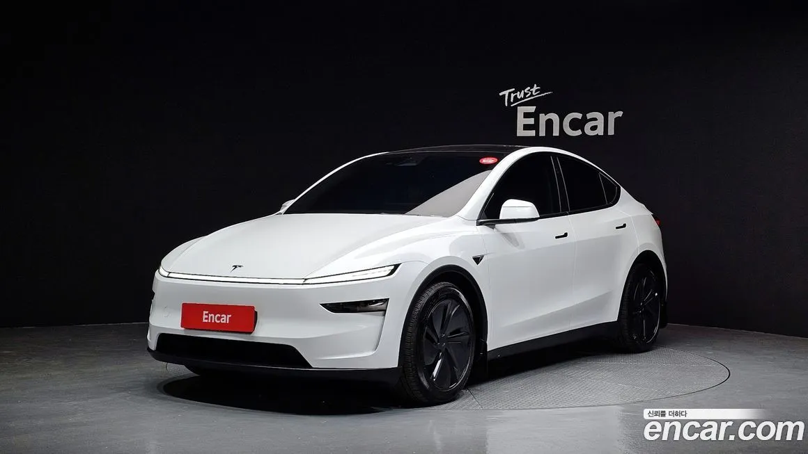 Tesla Model Y — фото 1