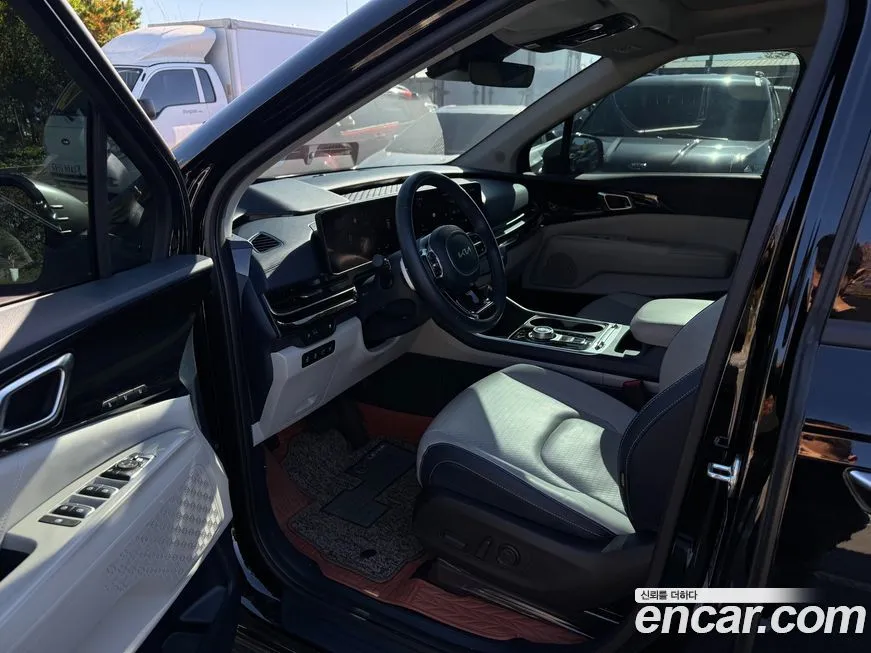 Kia Carnival — фото 10