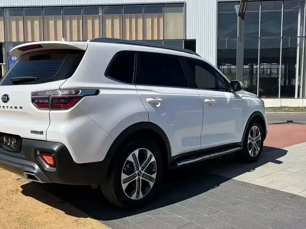 Kia Sportage — фото 9