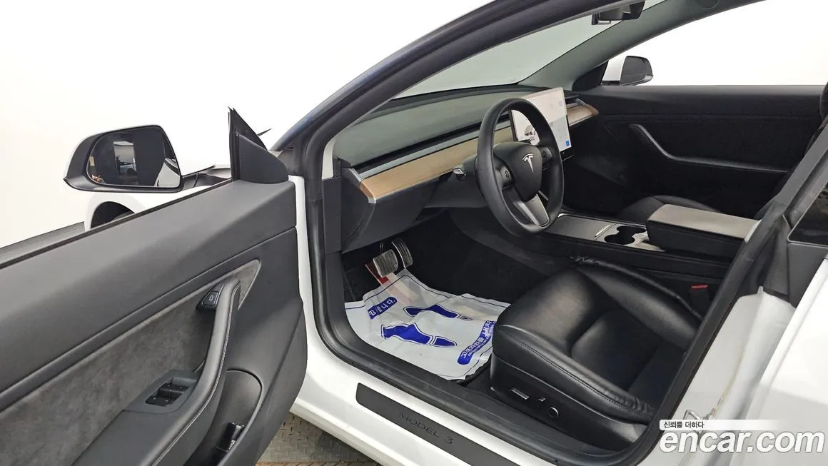Tesla Model 3 — фото 10