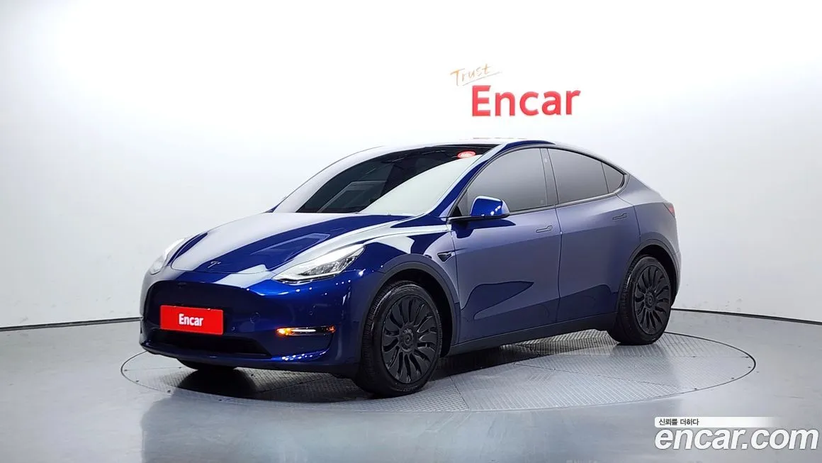 Tesla Model Y — фото 1