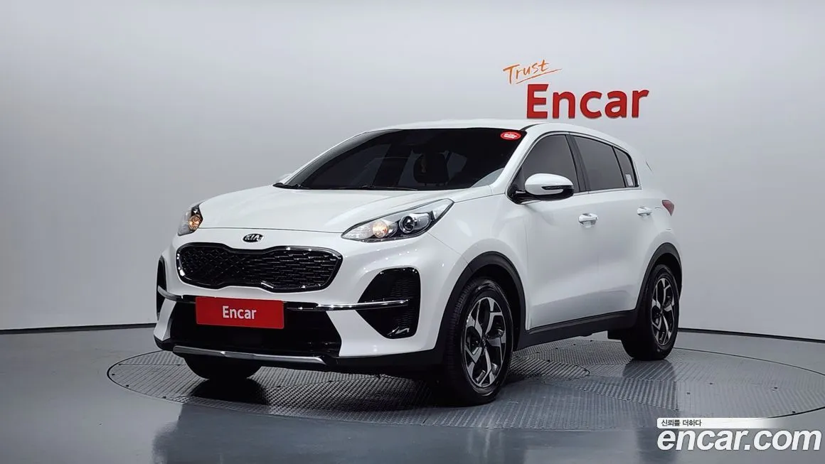 Kia Sportage — фото 1