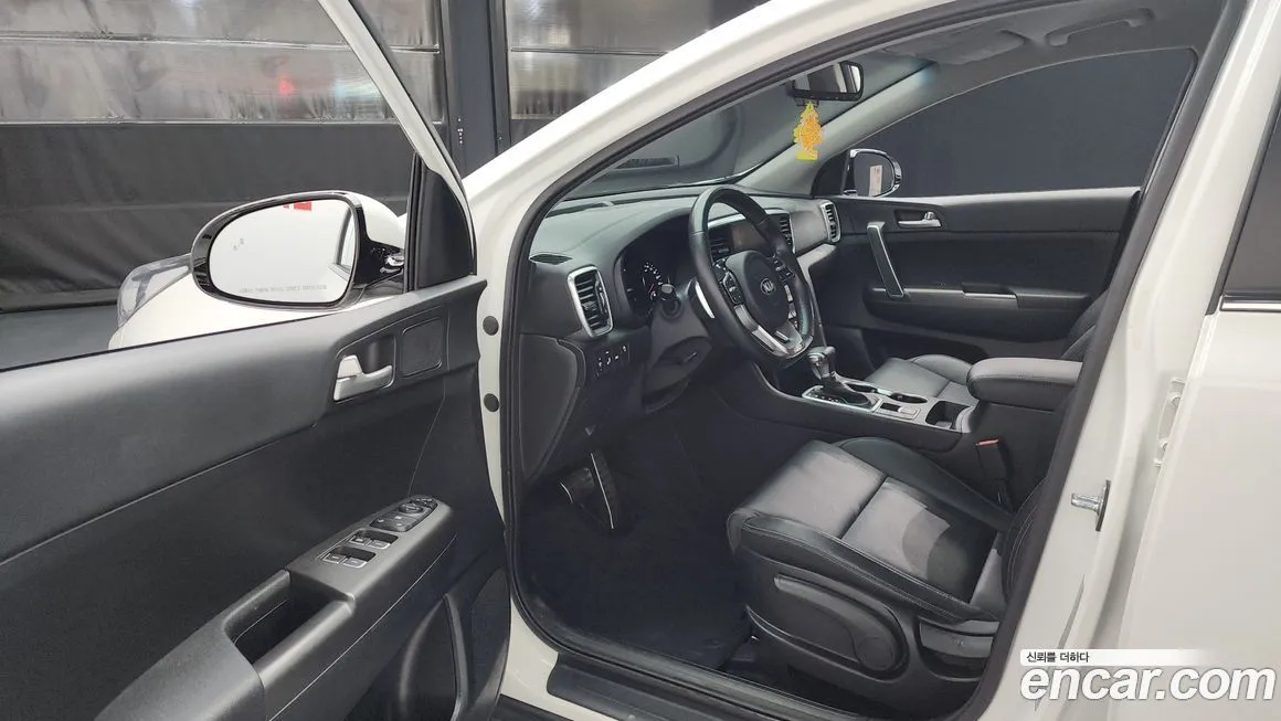 Kia Sportage — фото 10