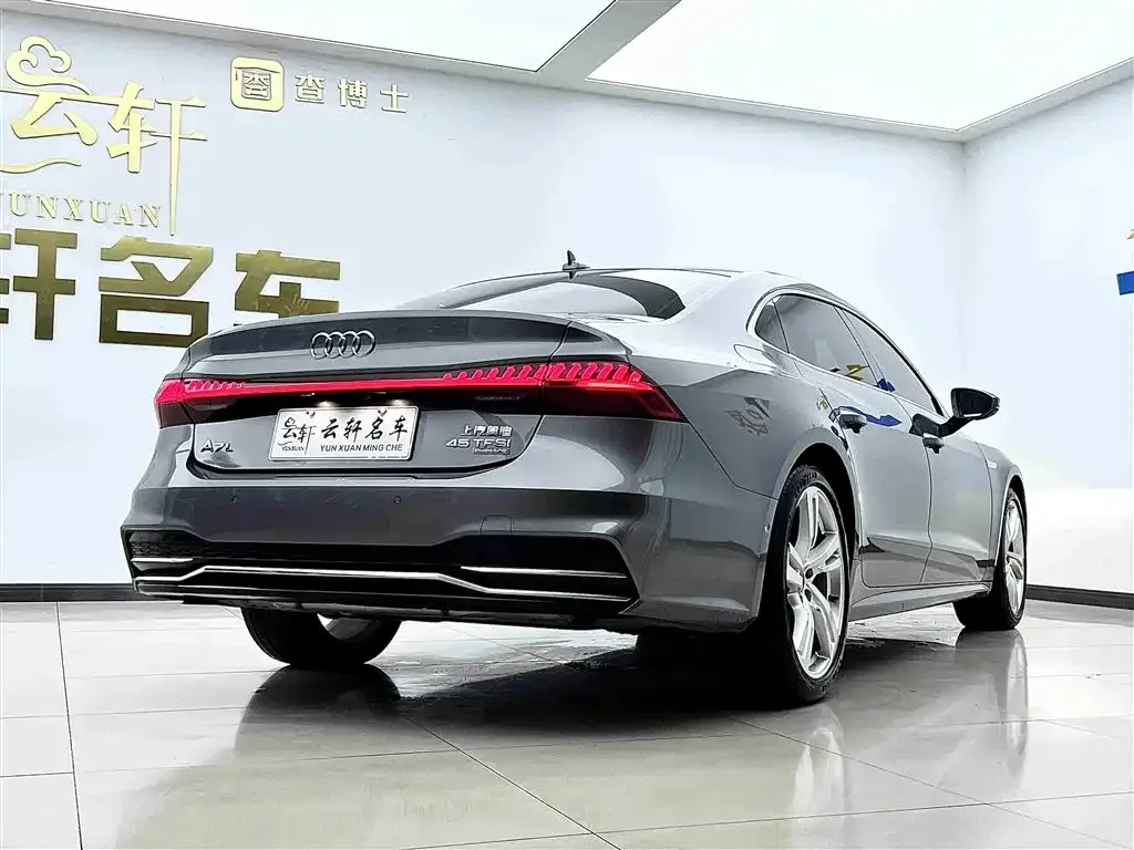 Audi A7L — фото 7