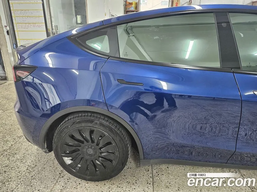 Tesla Model Y — фото 6