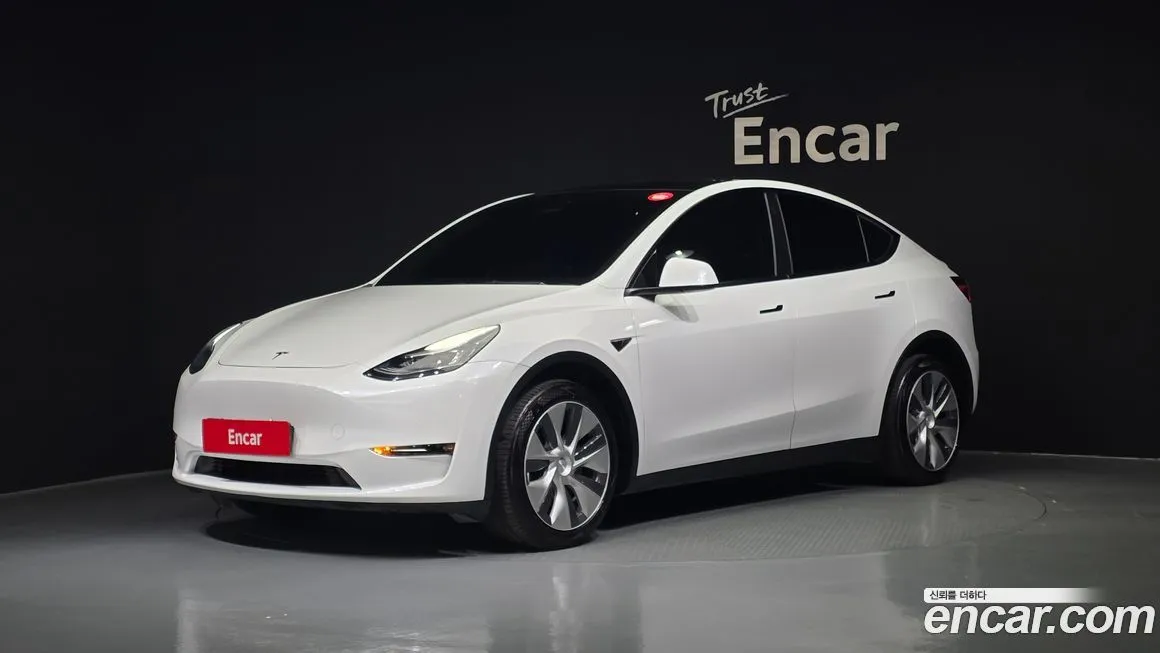 Tesla Model Y — фото 1