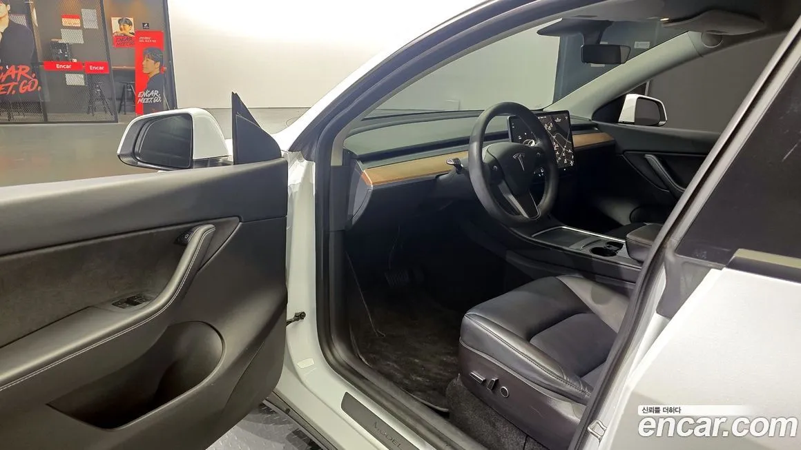 Tesla Model Y — фото 10