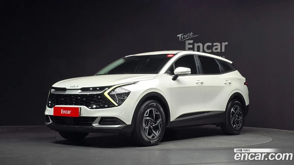 Kia Sportage — фото 1