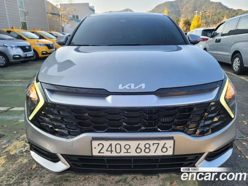 Kia Sportage — фото 1