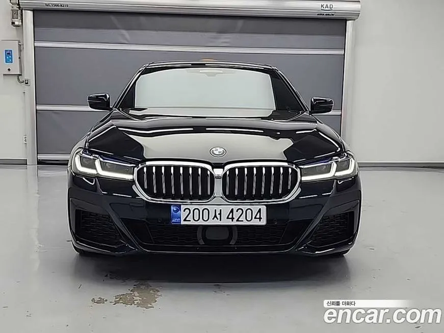 BMW 5-Series — фото 1