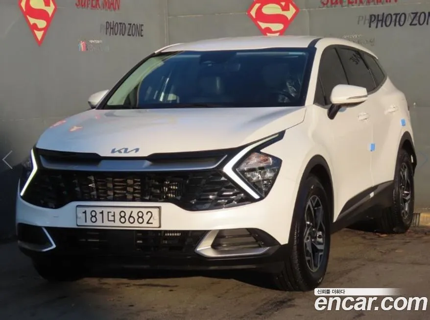 Kia Sportage — фото 1
