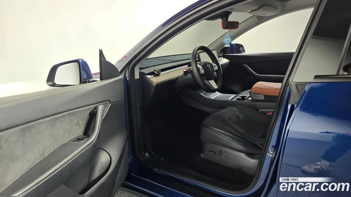 Tesla Model Y — фото 10