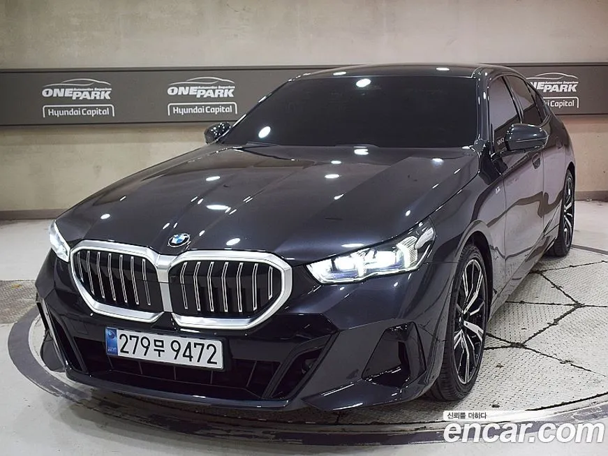 BMW 5-Series — фото 1