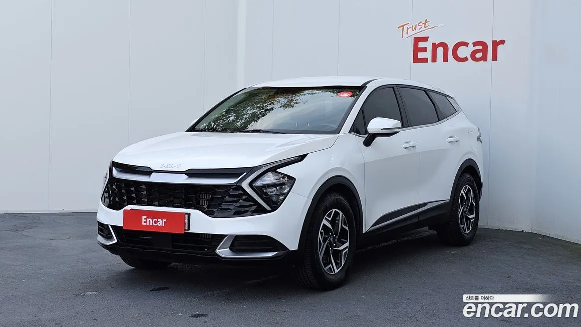 Kia Sportage — фото 1