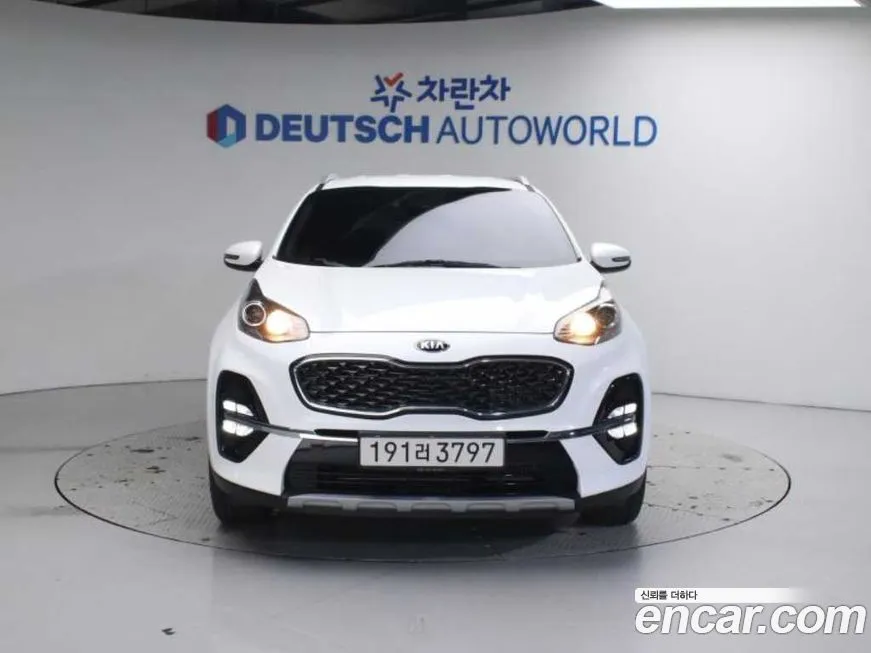 Kia Sportage — фото 1
