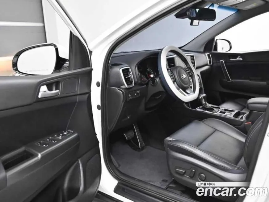 Kia Sportage — фото 10