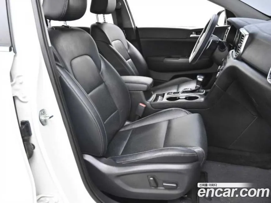 Kia Sportage — фото 9