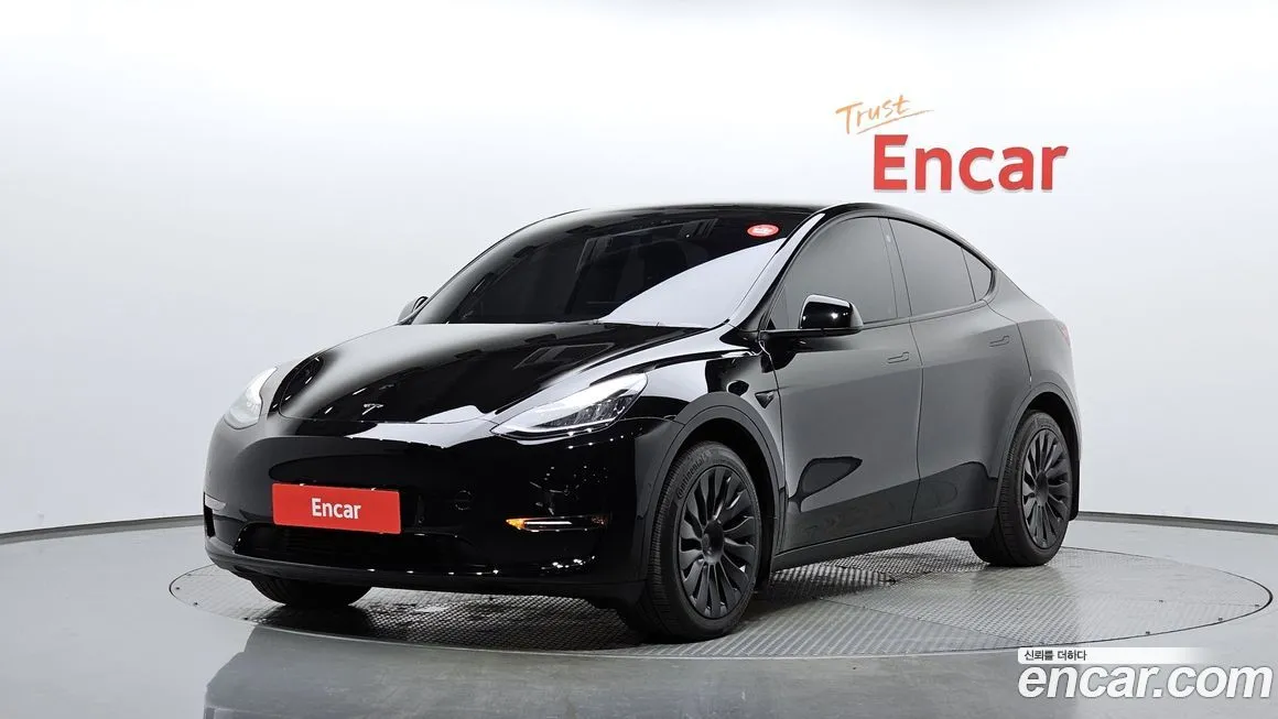 Tesla Model Y — фото 1