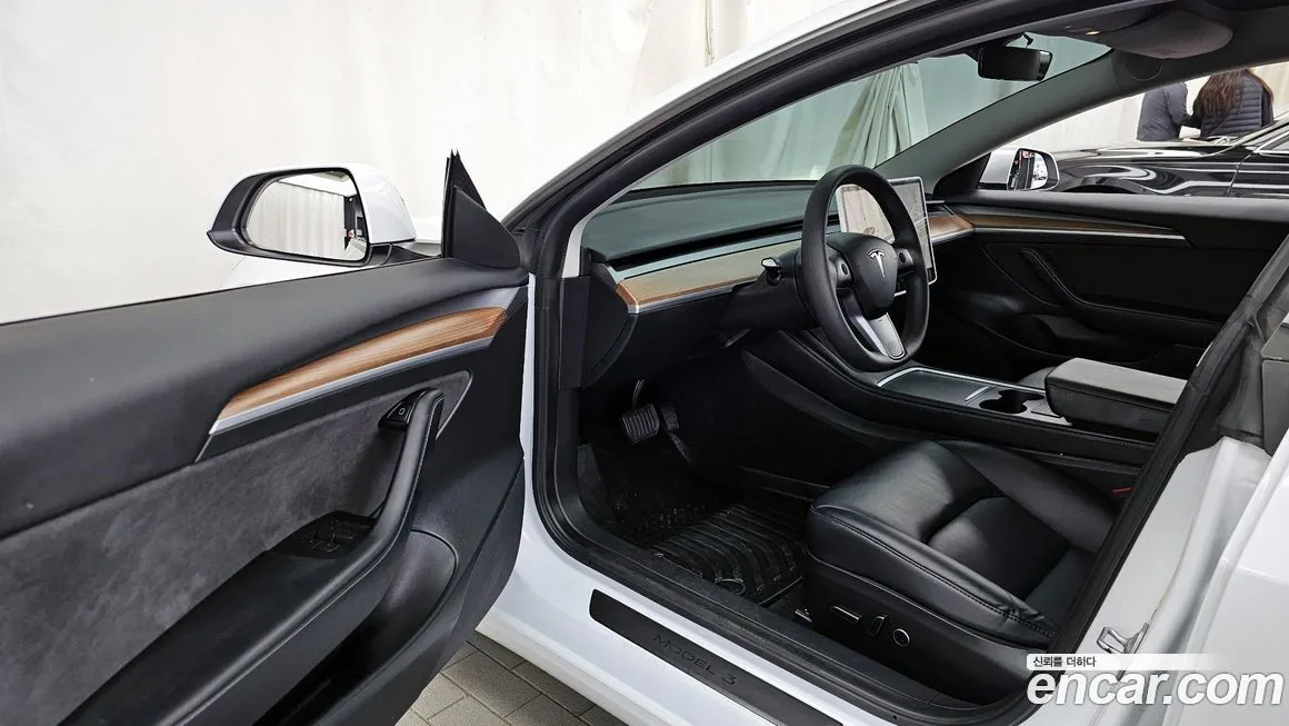 Tesla Model 3 — фото 10