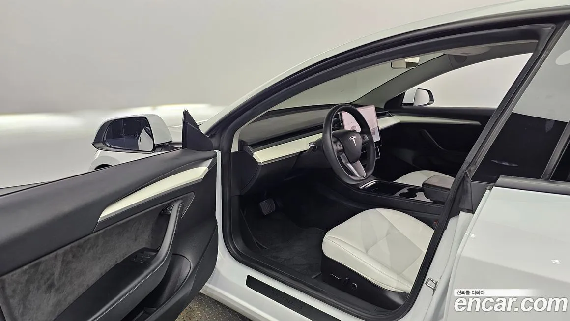 Tesla Model 3 — фото 10