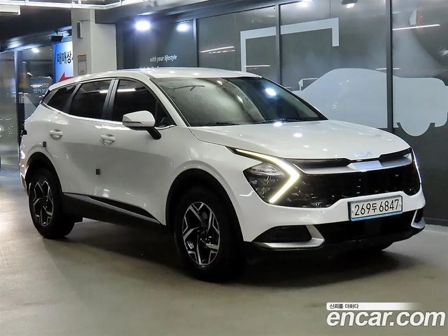 Kia Sportage — фото 1