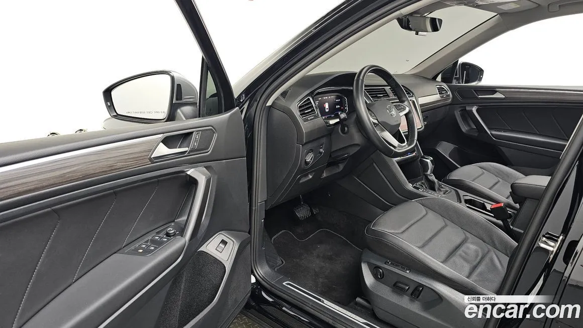 Volkswagen Tiguan — фото 10