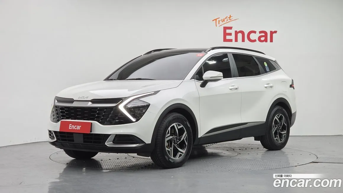 Kia Sportage — фото 1