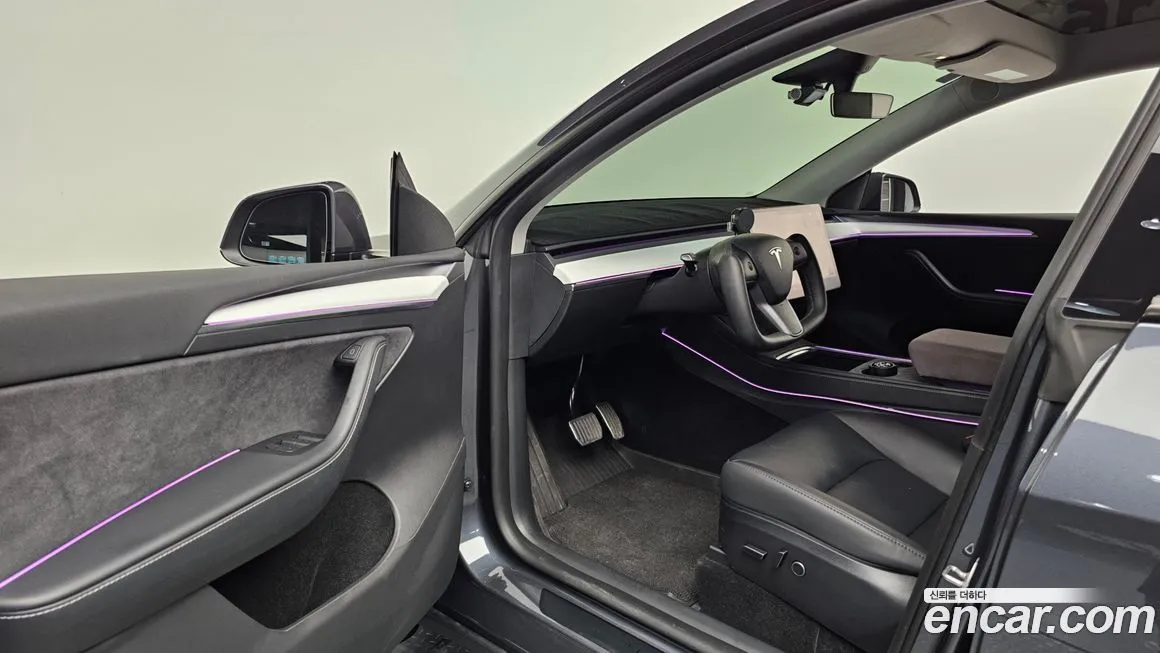 Tesla Model Y — фото 10