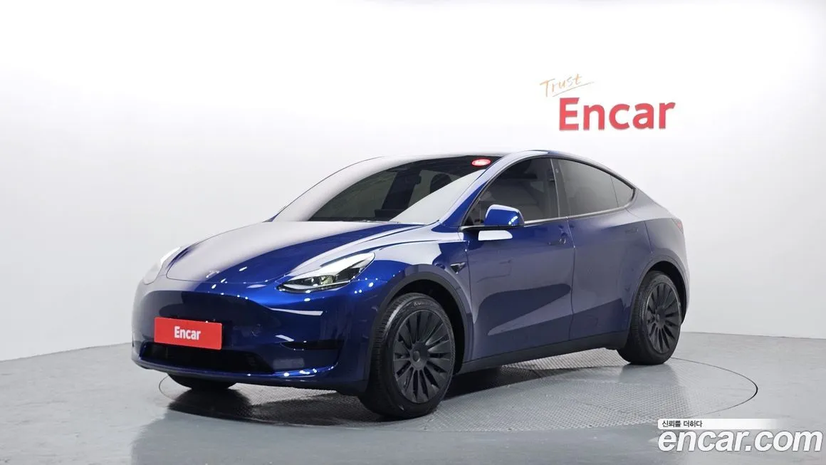 Tesla Model Y — фото 1