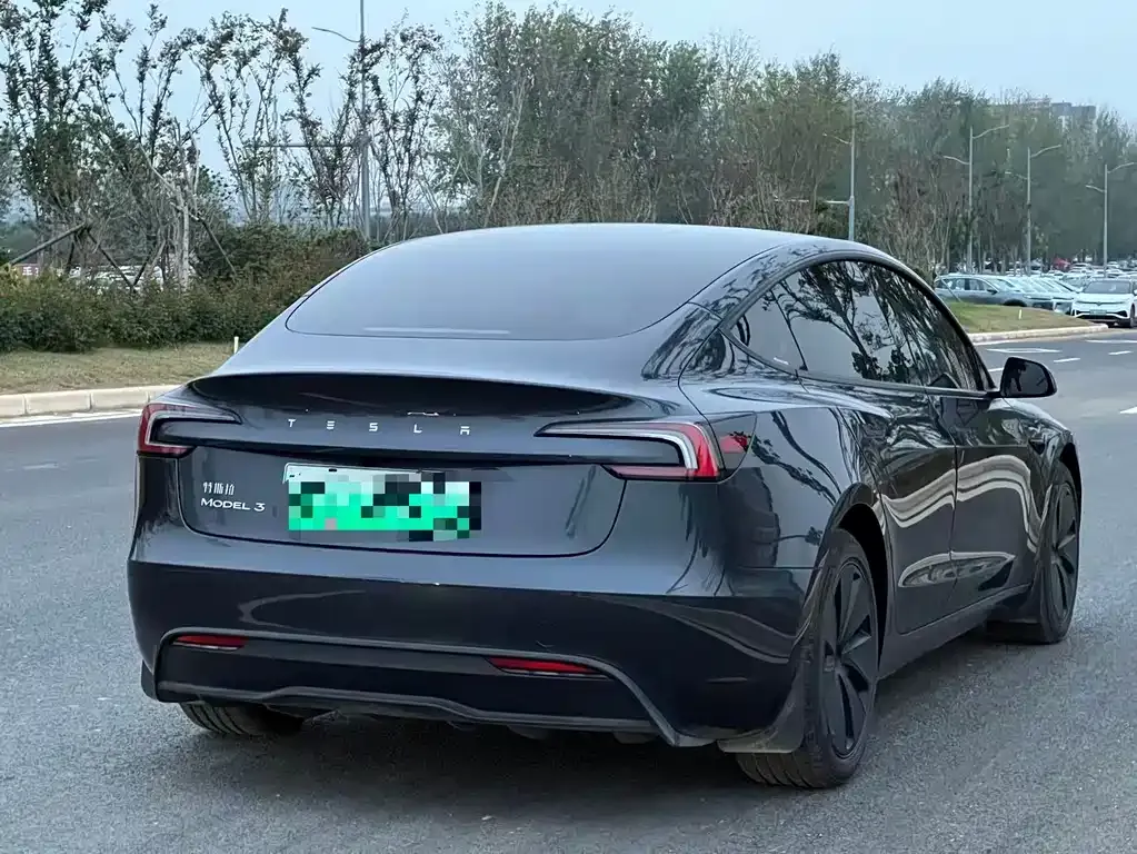 Tesla Model 3 — фото 5