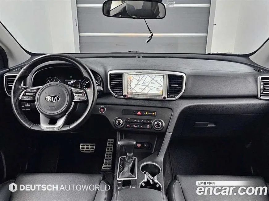 Kia Sportage — фото 7