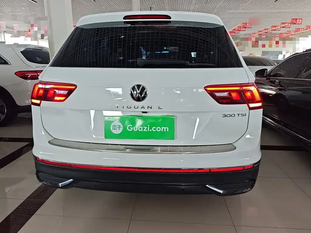 Volkswagen Tiguan L — фото 6
