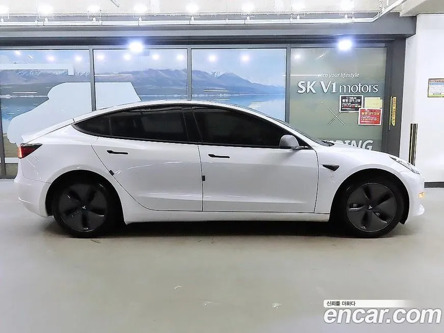 Tesla Model 3 — фото 3