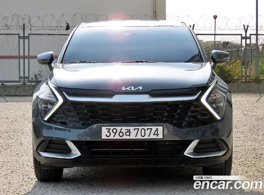 Kia Sportage — фото 1