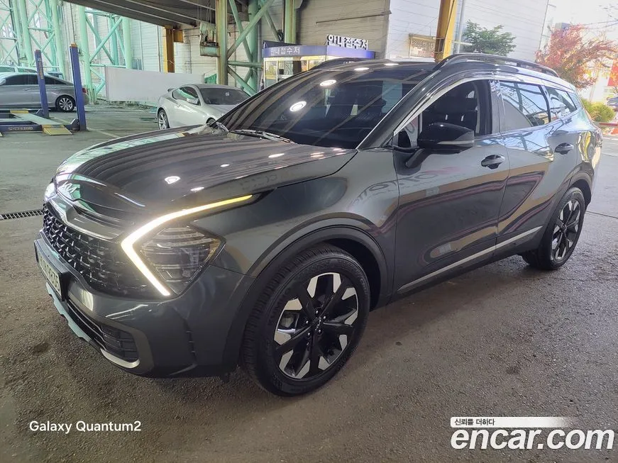 Kia Sportage — фото 1