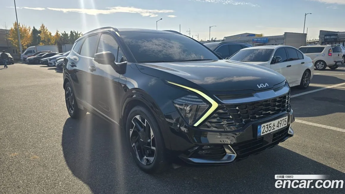 Kia Sportage — фото 1