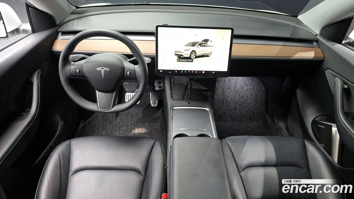 Tesla Model Y — фото 7